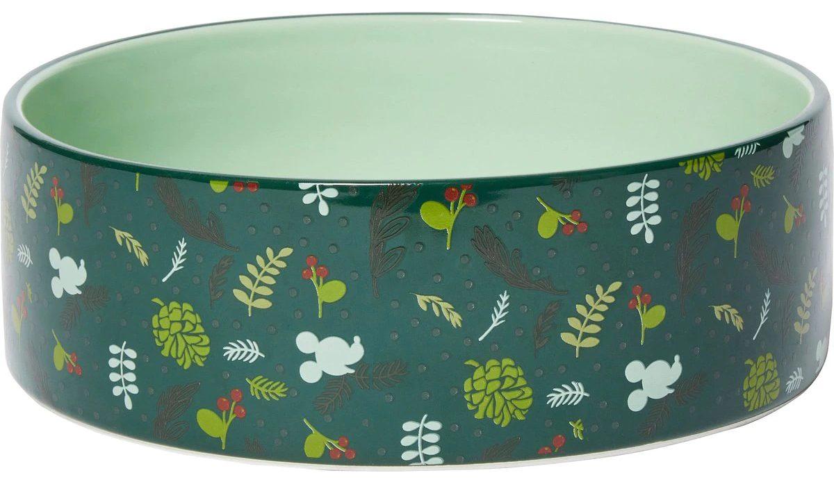 Ceramic dog bowl with Mickey Mouse holiday design.